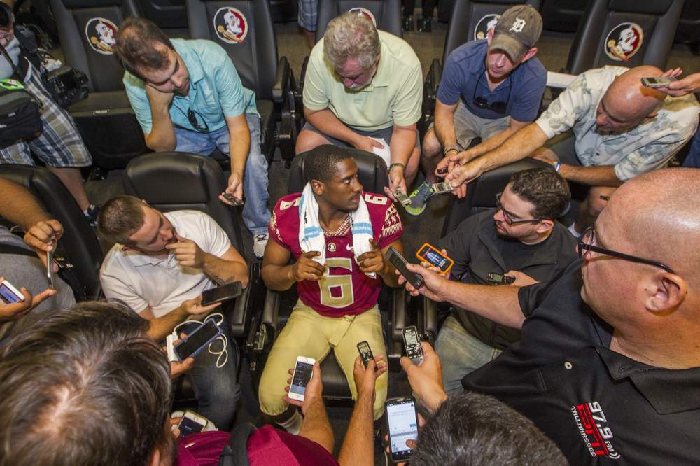 Everett Golson has been the center of attention as the Seminoles prepare to defend their ACC title in Tallahassee. (Mark Wallheiser/AP)