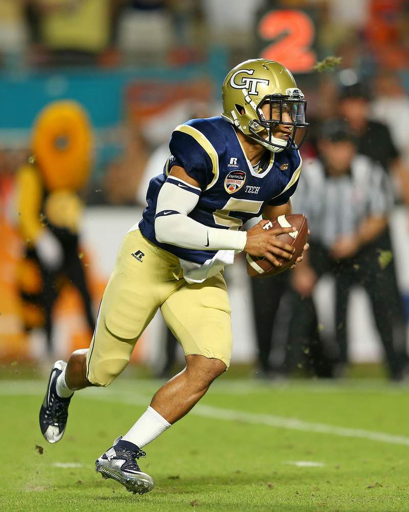 Tech quarterback Justin Thomas breaks off for the end zone during the Orange Bowl against Mississippi State. (Marc Serota / Getty Images)